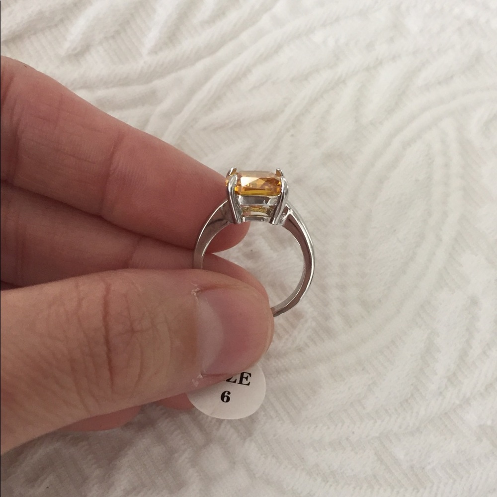 Emerald cut canary yellow diamond cubic zirconia - Picture 3 of 6